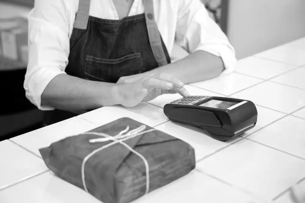 A card payment at a shop counter