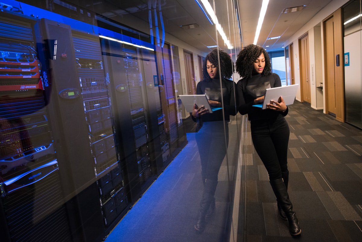 A person walking through a server room